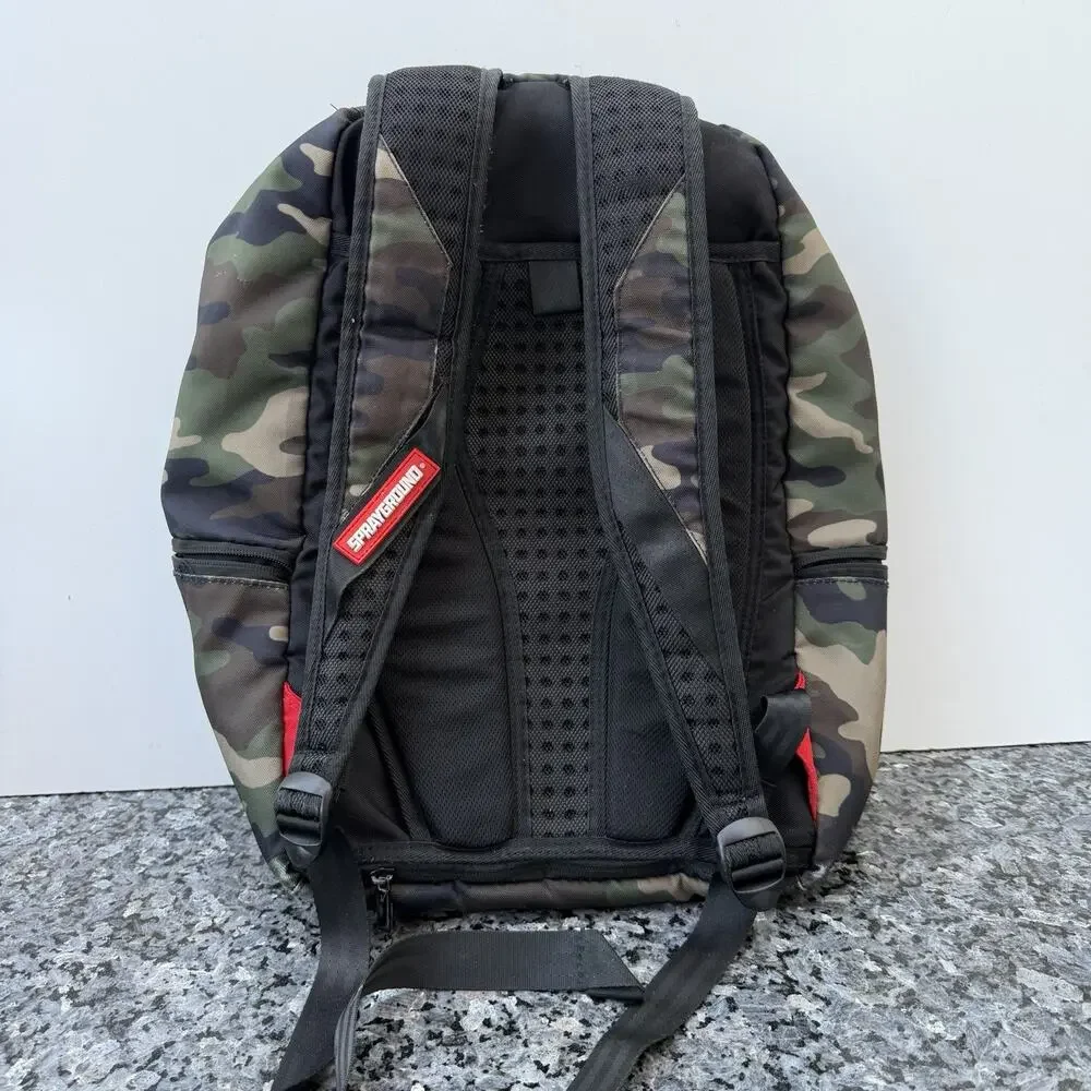 Sprayground Camouflage Backpack with Peace Sign Patch